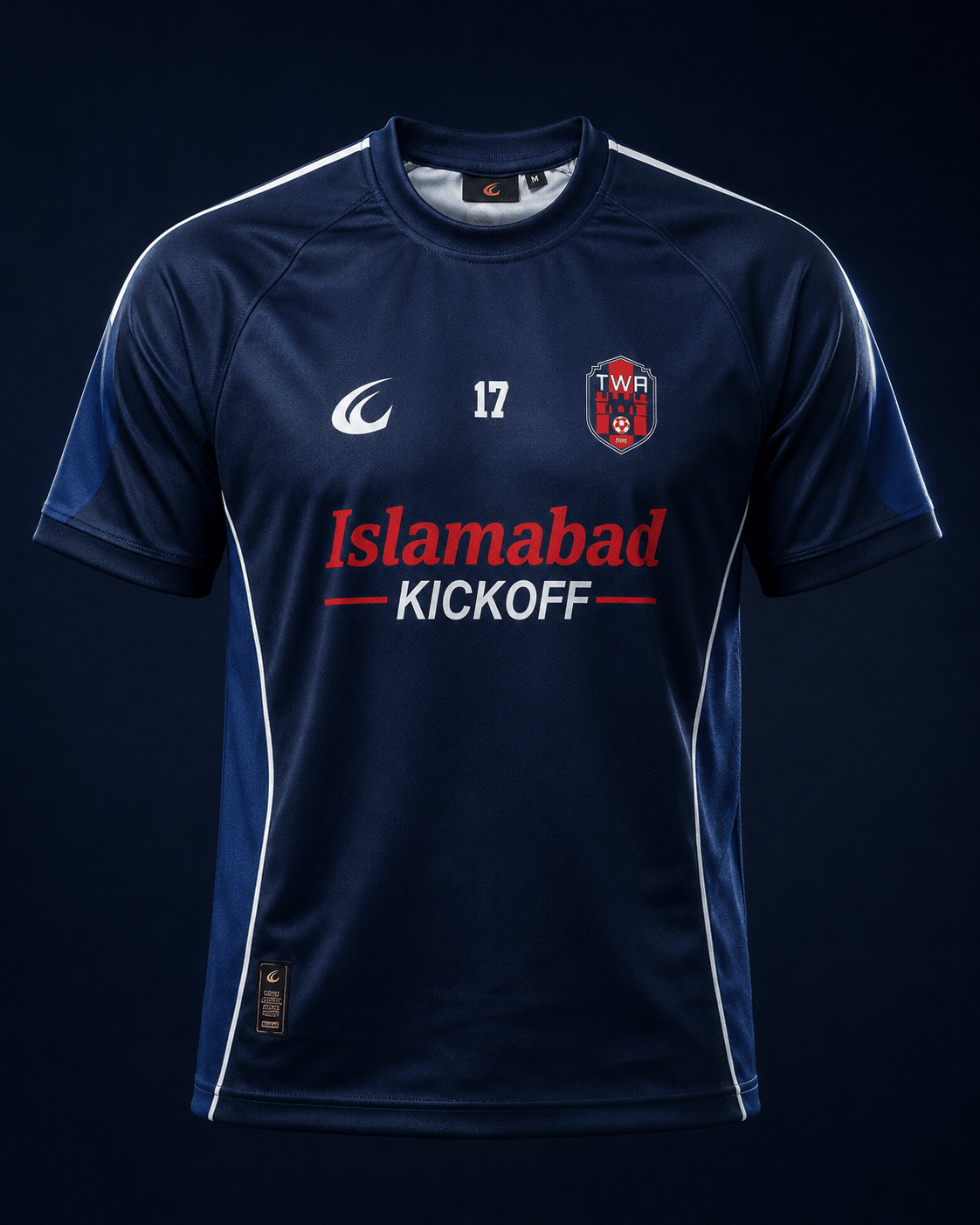 The TWA FC navy home shirt, lit in a dark studio