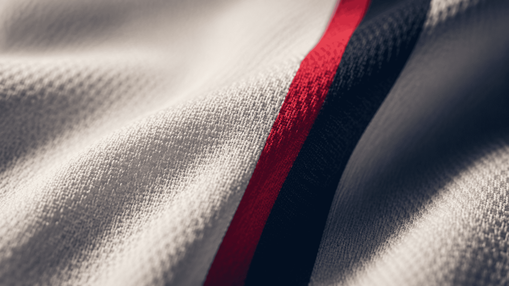 A macro shot of the CoolTech mesh fabric the shirts are made from