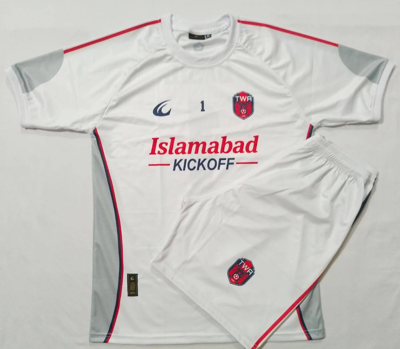 The white away shirt and shorts laid out flat together